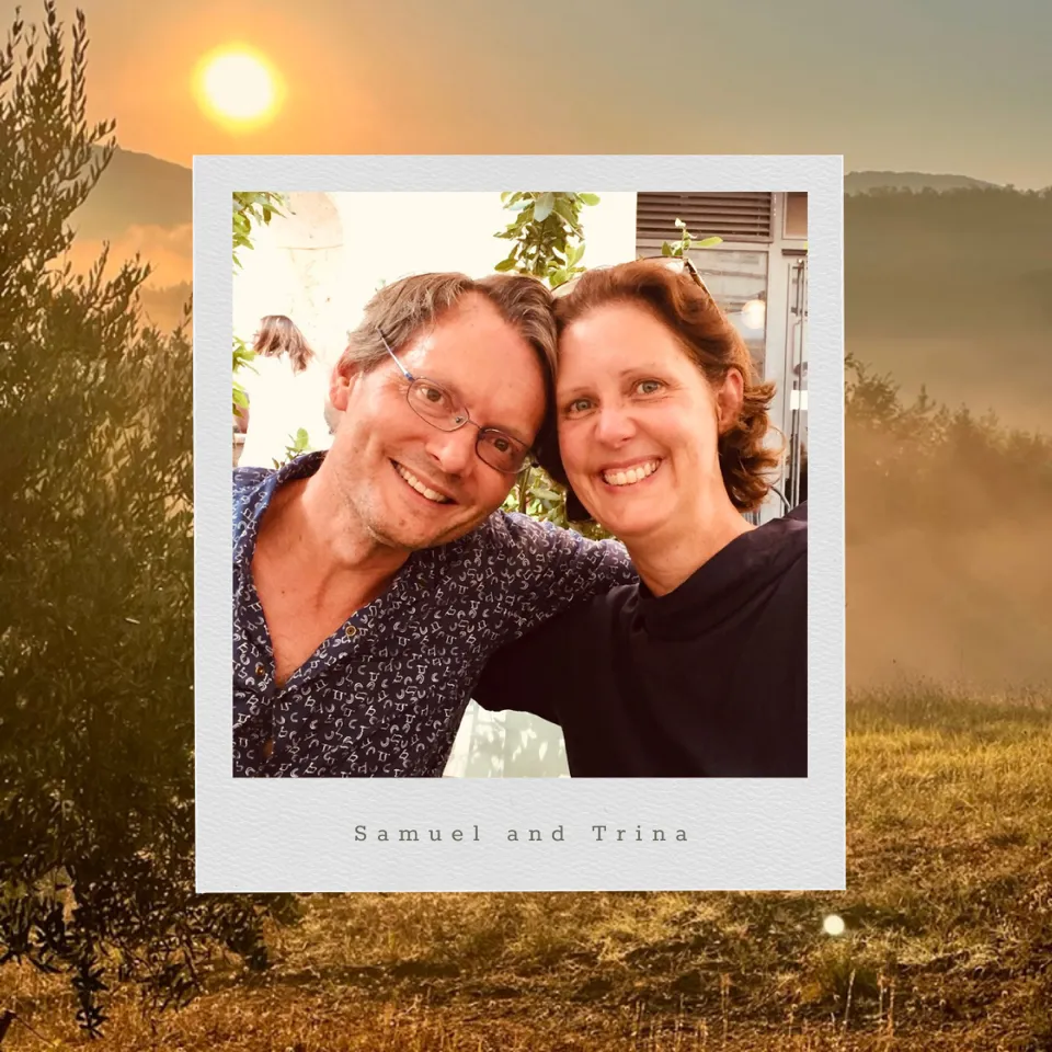 Samuel and Trina, in a print set against the misty hills at sunrise
